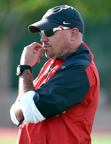 Tony Sanchez, shown watching spring practice at Rebel Park back in March, takes over the UNLV football program this season after winning six state championships at Bishop Gorman High School. Sanch ...
