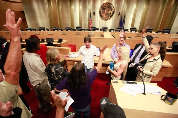 Las Vegas City Attorney Brad Jerbic speaks to a group of people about the Fremont Street performer ordinance at Las Vegas City Hall on Tuesday, Aug. 11, 2015. The proposed draft would require stre ...