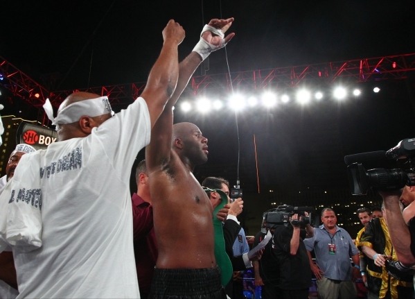 Trevor Bryan celebrates his victory against Derric Rossy, not pictured, in their NABF heavyweight title fight at the Downtown Las Vegas Events Center in Las Vegas on Friday, Aug. 28, 2015. Chase S ...