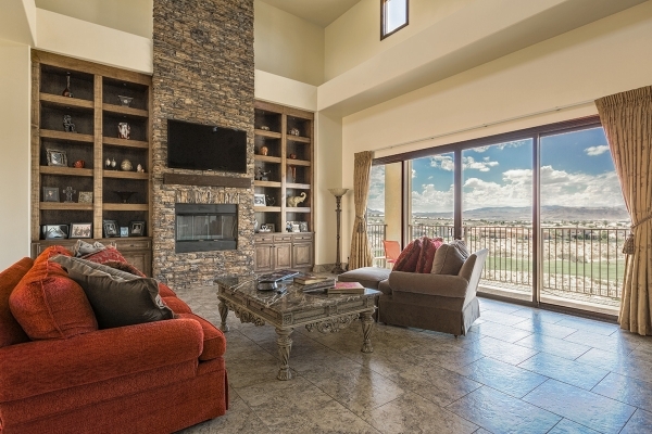 Angela and Matt Stabile recently moved into a Mediterranean-style house in Seven Hills that overlooks the Rio Secco Golf Course. The center of the home is the great room with a focal wall of brick ...