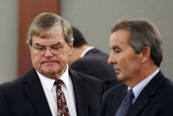 Dr. Albert Capanna, left, and his defense attorney Anthony Lauriu appear at the Regional Justice Center in Las Vegas Friday, Aug. 28, 2015. Capanna is sued by A former UNLV, Bishop Gorman player B ...