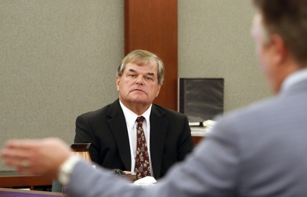 Dr. Albert Capanna, left, listens to Attorney Dennis Prince during cross examination at his trial at the Regional Justice Center in Las Vegas Friday, Aug. 28, 2015. Capanna is sued by A former UNL ...