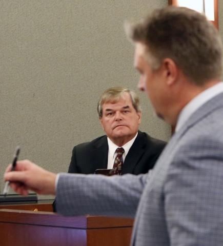Dr. Albert Capanna, left, listens to Attorney Dennis Prince during cross examination at his trial at the Regional Justice Center in Las Vegas Friday, Aug. 28, 2015. Capanna is sued by A former UNL ...