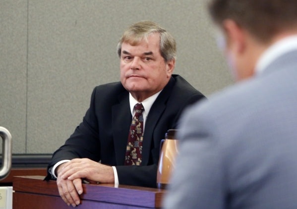 Dr. Albert Capanna, left, listens to Attorney Dennis Prince during cross examination at his trial at the Regional Justice Center in Las Vegas Friday, Aug. 28, 2015. Capanna is sued by A former UNL ...