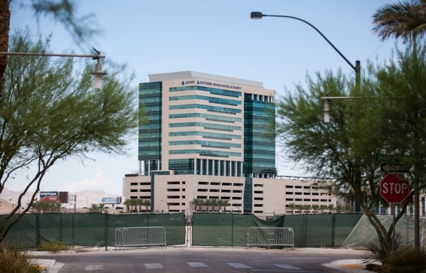 Fenced off undeveloped land that is part of Symphony Park is shown, with Molasky Corporate Center in the background, in Las Vegas on Friday, Aug. 28, 2015. Chase Stevens/Las Vegas Review-Journal F ...