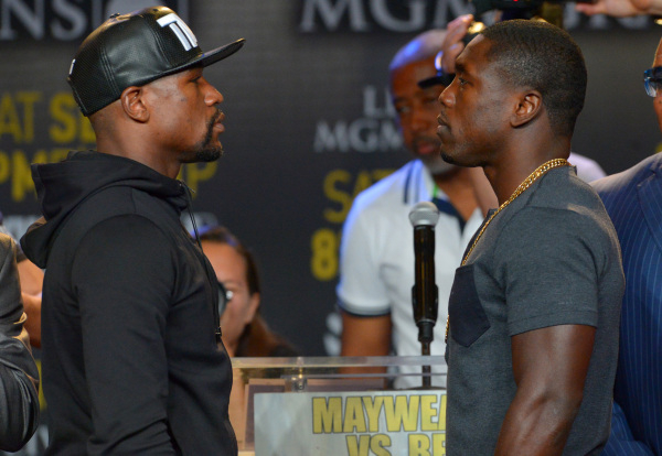Aug 6, 2015; Los Angeles, CA, USA; Floyd Mayweather, Jr. and Andre Berto face off during a press conference to announce the upcoming fight on September 12, 2015 at J.W. Marriott LA Live. Mandatory ...