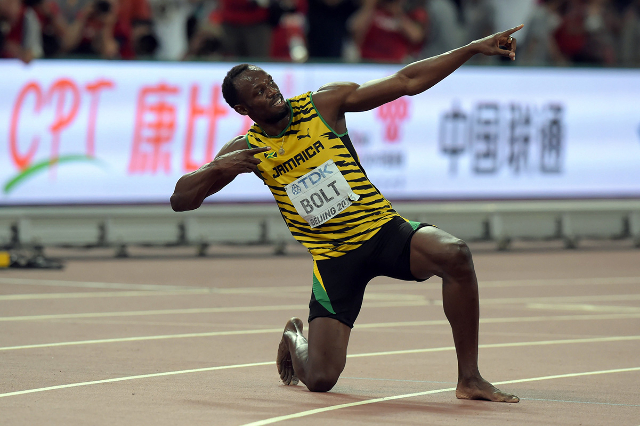 Aug 27, 2015; Beijing, China; Usain Bolt (JAM) poses after winning the 200m in 19.55 during the IAAF World Championships in Athletics at National Stadium. (Kirby Lee/USA Today Sports)