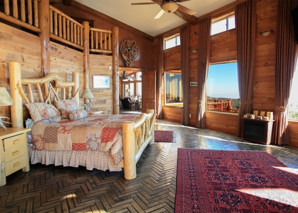 The oversized master suite is designed for the owner to witness the sun rising over the mountain. Of course, it has drapes to block out the early-morning light for late sleepers. The master has a  ...