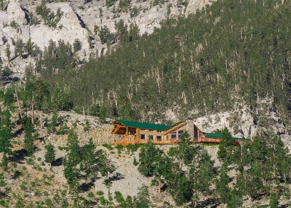 Ennis Jordan, a Harley motorcycle enthusiast, was riding up Mount Charleston 14 years ago when he spotted a small cabin between Lee and Kyle canyons along Duck Creek Road. He tore it down and spe ...