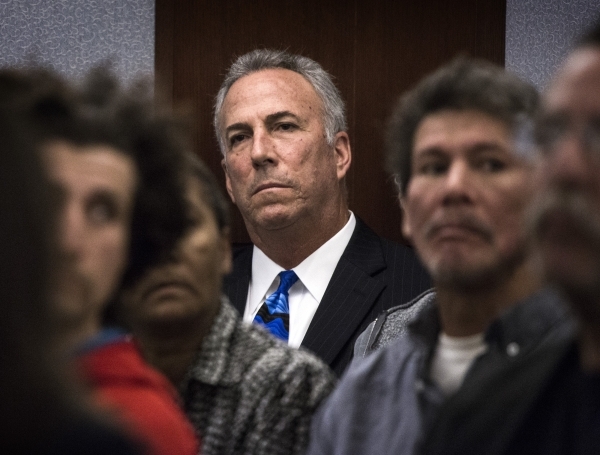 Clark County District Attorney Steve Wolfson listens during the arraignment of Jerry Howard, 24, Friday, Jan. 9,2015 in Las Vegas Justice Court. Howard is accused of sexually assaulting a woman ...