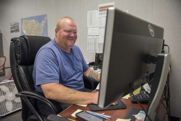TowerCom Technologies employee Darren Van Gerpen works at his office at the Henderson Business Resource Center Friday, Aug. 28, 2015. The Center is a business incubator for small and start-up busi ...