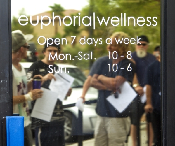 A reflection of patients is seen while they stand in line at Euphoria Wellness, 7780 S. Jones Boulevard on Wednesday, Aug. 26, 2015. JEFF SCHEID/LAS VEGAS REVIEW-JOURNAL Follow him