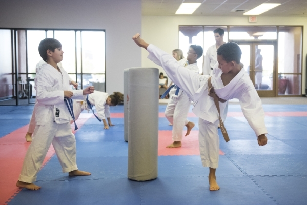 Karate students are taught by Hiroshi Allen at Allen‘s new dojo location at 8433 West Lake Mead Blvd.in Las Vegas Wednesday, Sept. 9, 2015. (Jason Ogulnik/Las Vegas Review-Journal)