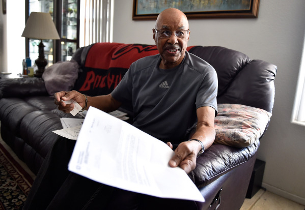 Retired Air Force veteran Willie Smith display a VA letter during an interview at his North Las Vegas home on Monday, Aug. 31, 2015. (David Becker/Las Vegas Review-Journal)