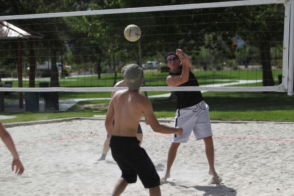 Chris Fava hits the ball over the net while playing volleyball at Sunset Park in Las Vegas Sunday, Aug. 30, 2015. Volleyball players are upset about the Clark County Parks and Recreation Departmen ...