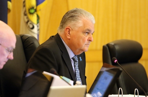 Commissioner Steve Sisolak, chairman, listens to public hearing for More Cops sales tax at of a County Commission meeting at the commission chambers Tuesday, Sept. 1, 2015, in Las Vegas. Ronda Chu ...
