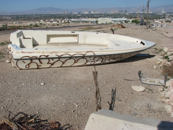Illegal dumping is a big problem, particularly on the edge of the valley as evidenced by a discarded couch at the corner of Hollywood Boulevard and Desert Inn Road on Sept. 5, 2015. (F. Andrew Tay ...