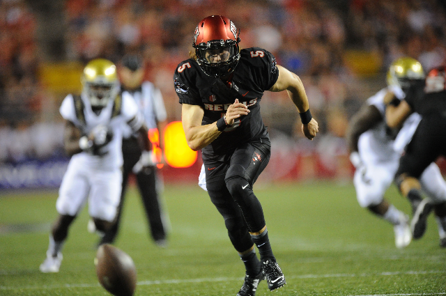 UNLV Rebels quarterback Blake Decker (5) chases after a high snap against the UCLA Bruins in the first quarter at Sam Boyd Stadium Saturday, Sept. 12 2015. Josh Holmberg/Las Vegas Review-Journal