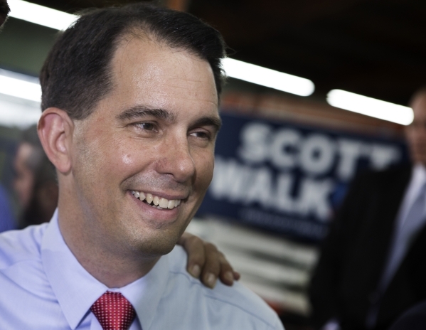 Republican presidential candidate Wisconsin Gov. Scott Walker greets supporters during a town hall at XTreme Manufacturing Warehouse,1415 West Bonanza Road, on Monday, Sept. 14, 2015JEFF SCHEID/LA ...
