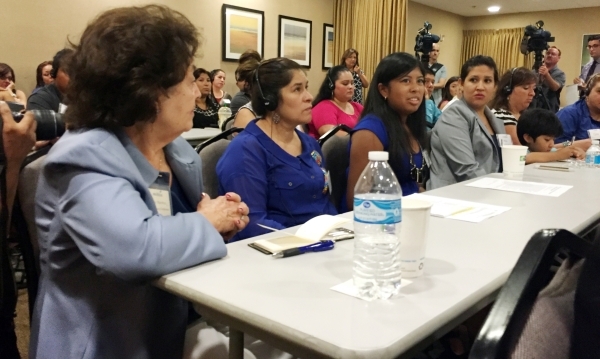Karen Preciado, third from left, speaks on Sept. 14, 2015, about the challenges her autistic brother experiences at Cimarron-Memorial High School. The 16-year-old senior attended conference for ad ...