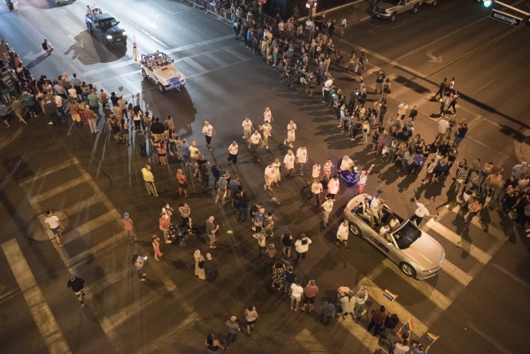 The audience is shown from the Fremont Street Experience parking garage during the 17th Annual PRIDE Night Parade in downtown Las Vegas Friday, Sept. 18, 2015. Jason Ogulnik/Las Vegas Review-Journal