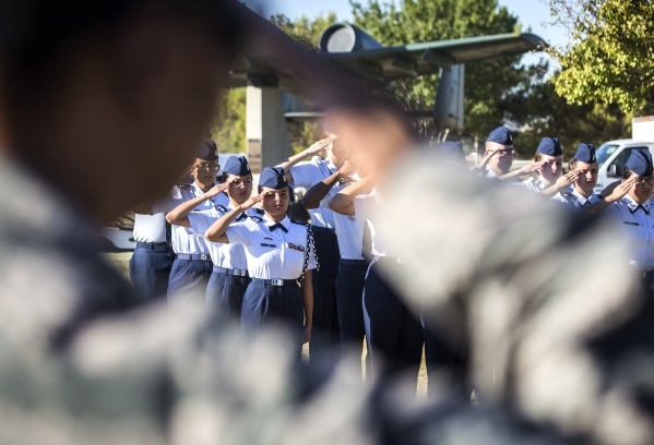 Members of the Air Force Junior ROTC salute during  National POW/MIA Recognition Day at Freedom Park at Nellis Air Force Base on Friday, Sept. 18,2015. JEFF SCHEID/LAS VEGAS REVIEW-JOURNAL Follow  ...
