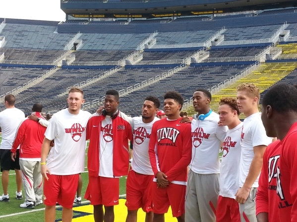 UNLV players pose for photos at Michigan Stadium on Friday. The Rebels are 35  -point underdogs today against the Wolverines. Mark Anderson/Las Vegas Review-Journal