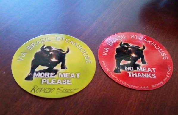 All-you-can-eat meats are served tableside at Via Brasil Steakhouse, 1225 S. Fort Apache Road, with guests turning over a green card to indicate when they are ready for more meat or a red card to ...