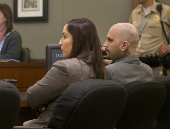 Defense attorney Monica Trujillo, left, and Michael Rodriguez listen to the prosecution before the verdict is read in his trial at the Regional Justice Center in downtown Las Vegas on Friday, Sept ...
