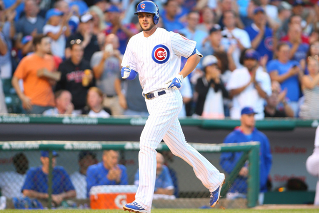 Aug 12, 2015; Chicago, IL, USA; Chicago Cubs third baseman Kris Bryant (17) heads for home after hitting a solo home run during the second inning against the Milwaukee Brewers at Wrigley Field. Ma ...