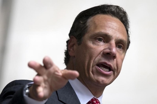 New York State governor Andrew Cuomo speaks at a rally to celebrate the passage of the minimum wage for fast-food workers by the New York State Fast Food Wage Board in New York July 22, 2015. (Reu ...