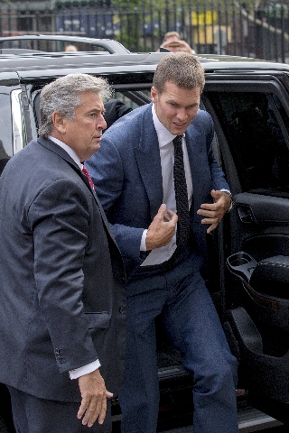 New England Patriots‘ quarterback Tom Brady (R) arrives at the Manhattan Federal Courthouse in New York August 31, 2015. Brady and NFL Commissioner Roger Goodell are due in a Manhattan feder ...