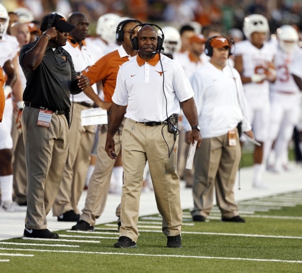 Texas Longhorns coach Charlie Strong coaches on the sidelines against the Notre Dame Fighting Irish at Notre Dame Stadium on Saturday. (Brian Spurlock-USA TODAY Sports)