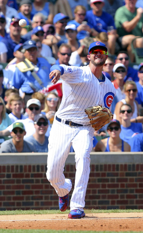 Sep 6, 2015; Chicago, IL, USA;  Chicago Cubs third baseman Kris Bryant (17) throws out Arizona Diamondbacks shortstop Nick Ahmed (not pictured) during the third inning at Wrigley Field. (Dennis Wi ...