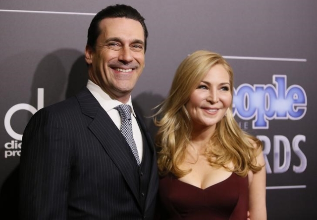 Actors Jon Hamm and Jennifer Westfeldt arrive at the People Magazine Awards in Beverly Hills, Calif., on December 18, 2014. (REUTERS/Danny Moloshok)
