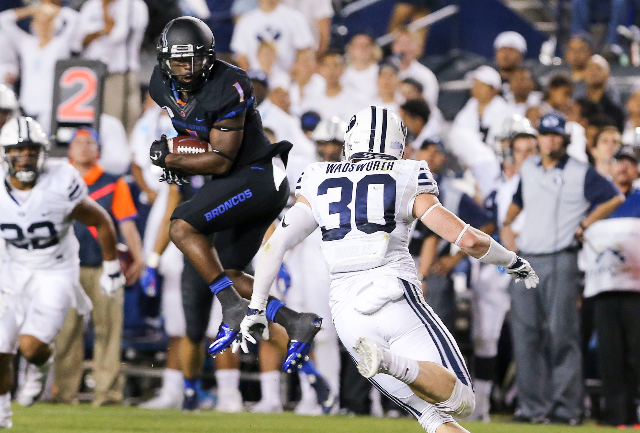 Sep 12, 2015; Provo, UT, USA; Boise State Broncos wide receiver Shane Williams-Rhodes (1) catches the ball and looks for Brigham Young Cougars defensive back Michael Wadsworth (30) during the seco ...