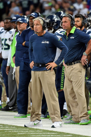 Sep 13, 2015; St. Louis, MO, USA; Seattle Seahawks head coach Pete Carroll stands on the sidelines in the game against the St. Louis Rams during the second half at the Edward Jones Dome. Mandatory ...