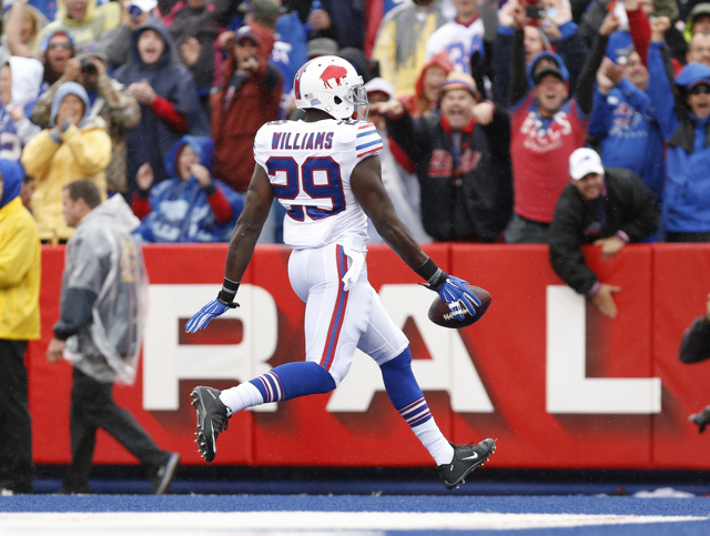 Sep 13, 2015; Orchard Park, NY, USA; Buffalo Bills running back Karlos Williams (29) runs for a touchdown during the first half against the Indianapolis Colts at Ralph Wilson Stadium. Bills beat t ...
