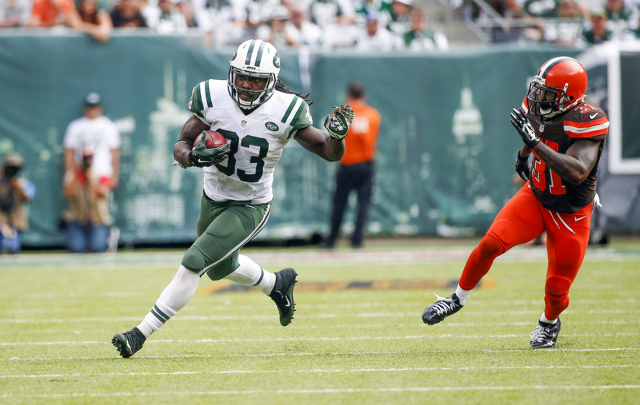 Dec 14, 2014; East Rutherford, NJ, USA; New York Jets running back Chris Ivory (33) breaks free for a 19-yard gain in the third quarter against the Cleveland Browns at MetLife Stadium. Mandatory C ...