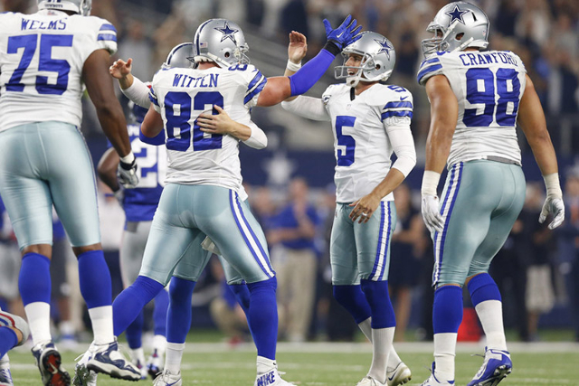 Sep 13, 2015; Arlington, TX, USA; Dallas Cowboys tight end Jason Witten (82) celebrates with kicker Dan Bailey (5) after Bailey kicked the game winning extra point against the New York Giants at A ...