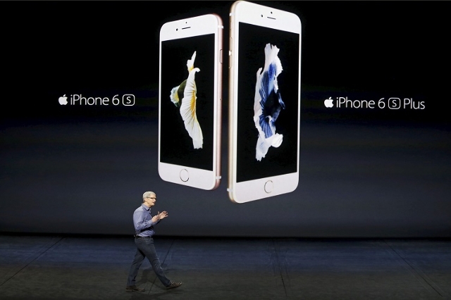 Apple CEO Tim Cook introduces the iPhone 6s and iPhone 6sPlus during an Apple media event in San Francisco, California, September 9, 2015.  Sales of Apple‘s new iPhones were on pace to beat  ...