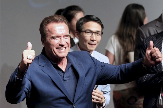 Actor Arnold Schwarzenegger attends a promotional tour for the film "Terminator Genisys" in Shanghai, China, in this file photo taken August 19, 2015. (Reuters/Aly Song/Files)