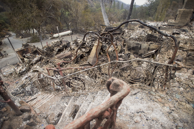 The charred remains of Harbin Hot Springs Resort are seen after the Valley Fire whipped through Middleton, California September 14, 2015. REUTERS/Noah Berger