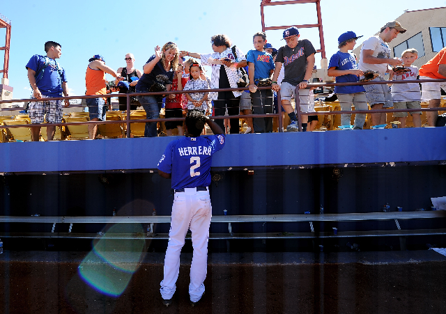 Las Vegas 51s second baseman Dilson Herrera signs autographs after the final game of the season at Cashman Field in Las Vegas on Monday. (Josh Holmberg/Las Vegas Review-Journal)