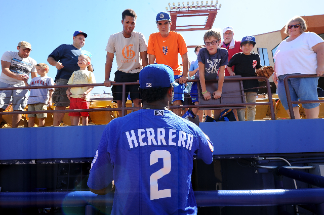 Las Vegas 51s second baseman Dilson Herrera signs autographs after the final game of the season at Cashman Field in Las Vegas on Monday. (Josh Holmberg/Las Vegas Review-Journal)