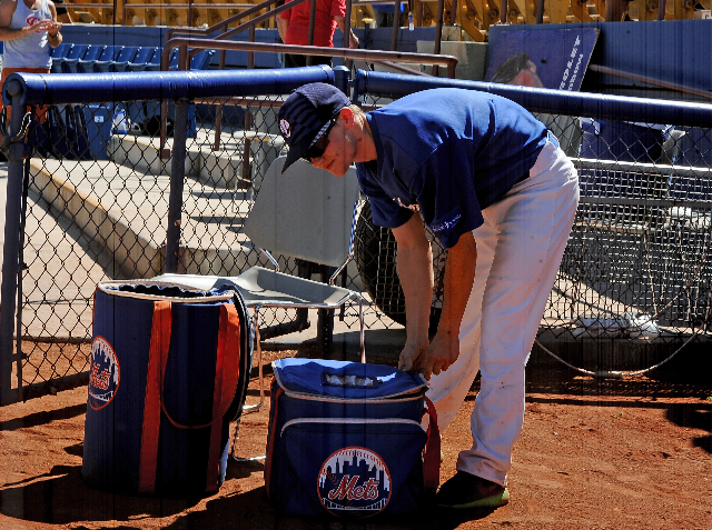 Las Vegas 51s batboy Andrew Kolb Jr. packs up the bags after the final game of the season at Cashman Field on Monday. (Josh Holmberg/Las Vegas Review-Journal)