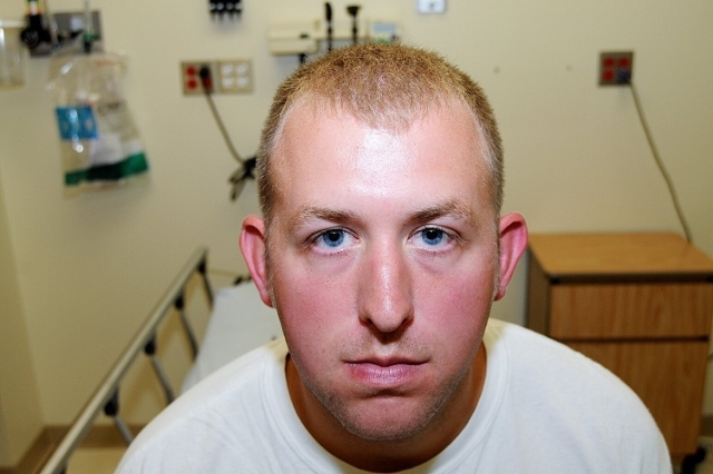 A photograph of Ferguson, Missouri police officer Darren Wilson as submitted as evidence to the St. Louis County Grand Jury. (St. Louis Co. Prosecutor‘s Office/CNN)