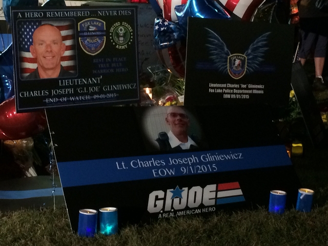 Residents and fellow police officers gather at the Fox Lake, Illinois Police Department on September 2, 2015, to remember the life of Lt. Joe Gliniewicz. Gliniewicz was shot and killed on Tuesday  ...