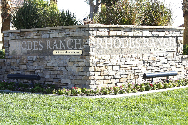 The Rhodes Ranch Golf Club entrance is shown where Las Vegas police are investigating a shooting that left one person wounded and one arrested at the 100 block of Crooked Putter Drive Monday, Sept ...