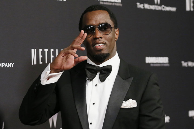 Sean "Diddy" Combs arrives at The Weinstein Company & Netflix after party after the 71st annual Golden Globe Awards in Beverly Hills, California, January 12, 2014. (Danny Moloshok/Re ...